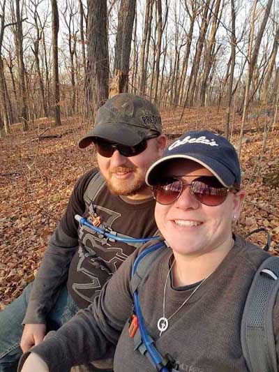 Megan and Zach Hiking in Woods